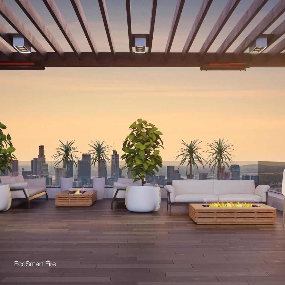 EcoSmart Fire Wharf 65" Rectangular Concrete Fire Pit Table in a Commercial Space