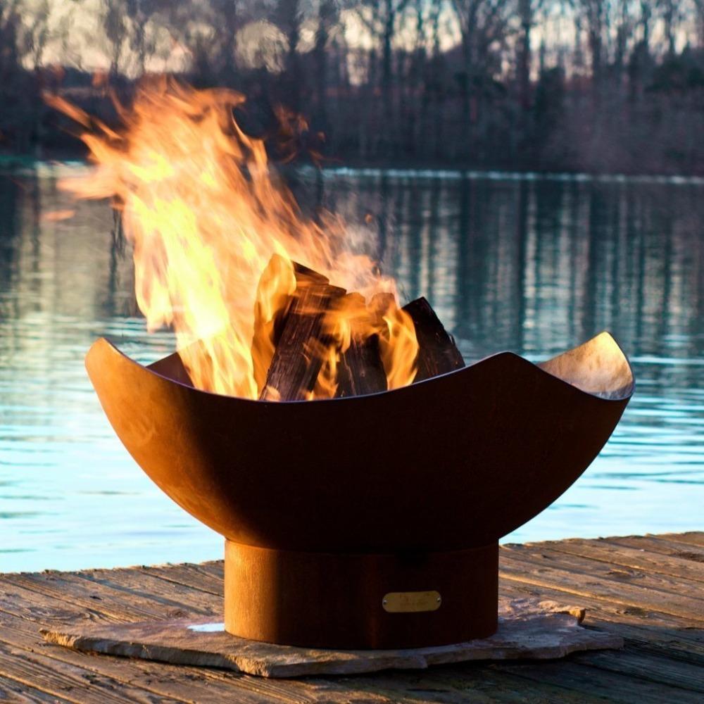 Fire Pit Art Manta Ray - 36&quot; Handcrafted Carbon Steel Fire Pit Lit Up Beside A Lake