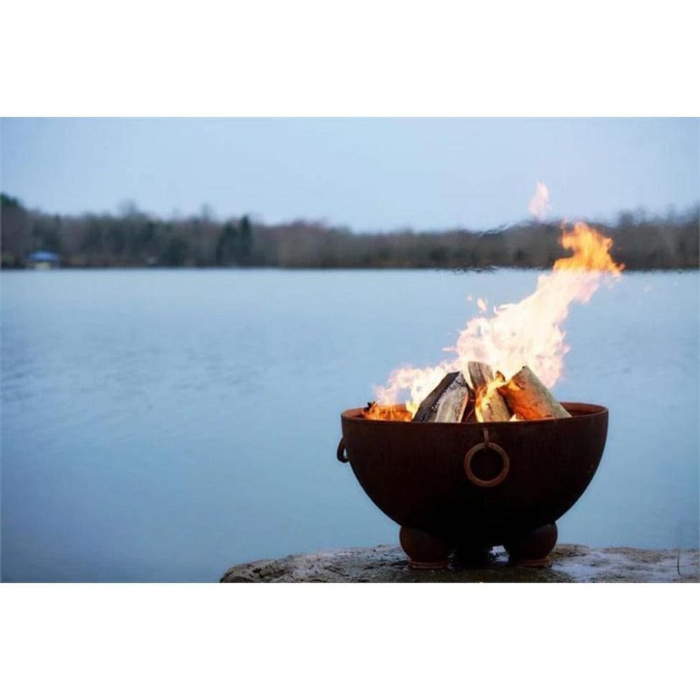 Wood Burning Fire Pit - Fire Pit Art Nepal - 41&quot; Steel Fire Pit (NP) Lit Up Beside A Lake