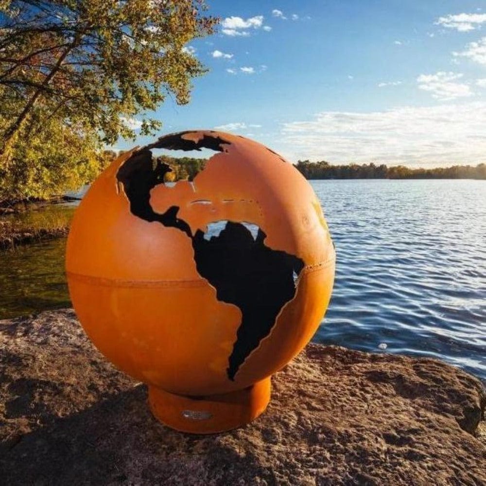 Fire Pit Art Third Rock - Globe Shaped 36&quot; Handcrafted Carbon Steel Fire Pit (TR) Beside A Lake