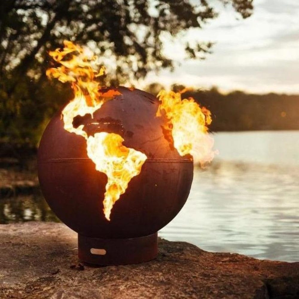 Fire Pit Art Third Rock - Globe Shaped 36" Handcrafted Carbon Steel Fire Pit (TR) Lit Up Beside A - alternate view