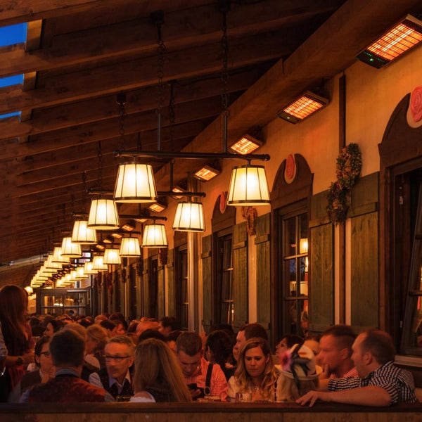 Heatscope Spot 35" Black Electric Heaters in Outdoor Dining Area