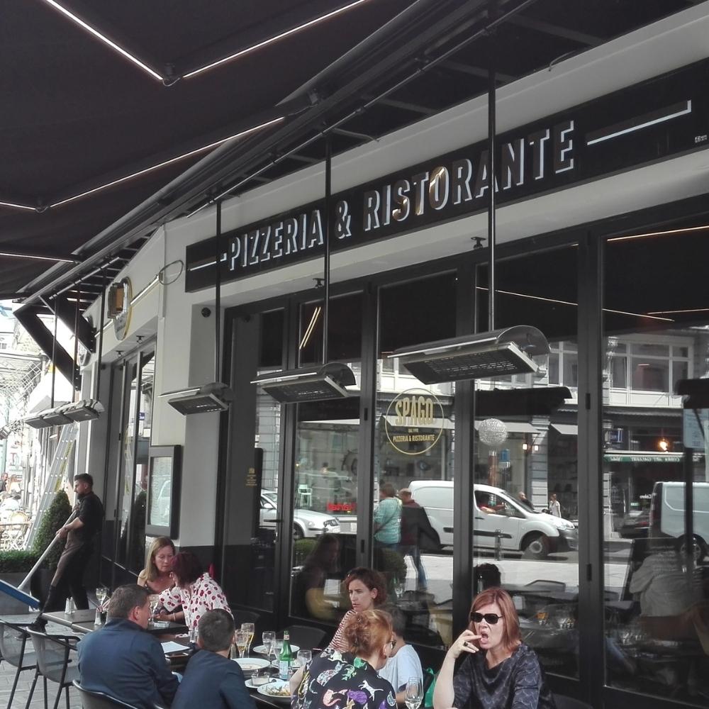 Heatscope Spot 35&quot; Black Electric Heaters in Restaurant