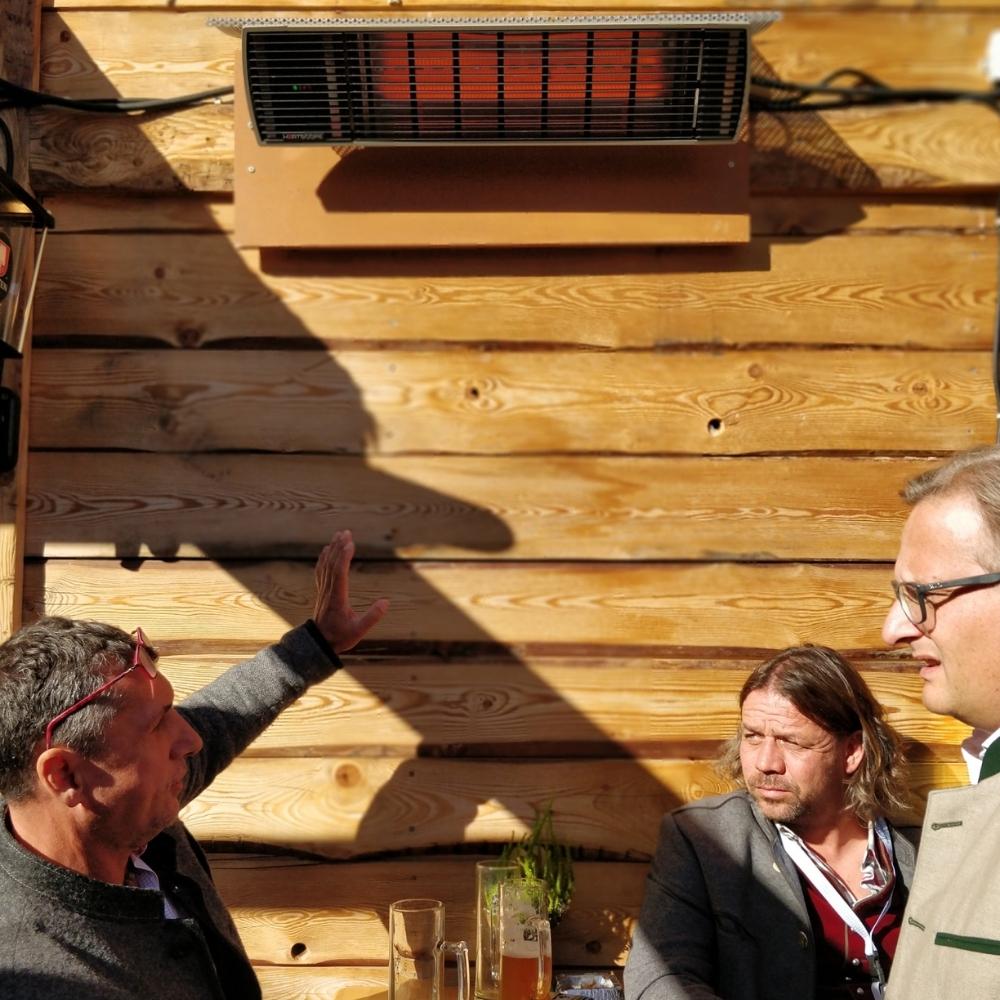 Heatscope Spot 35&quot; Black Electric Heater with People Outdoors