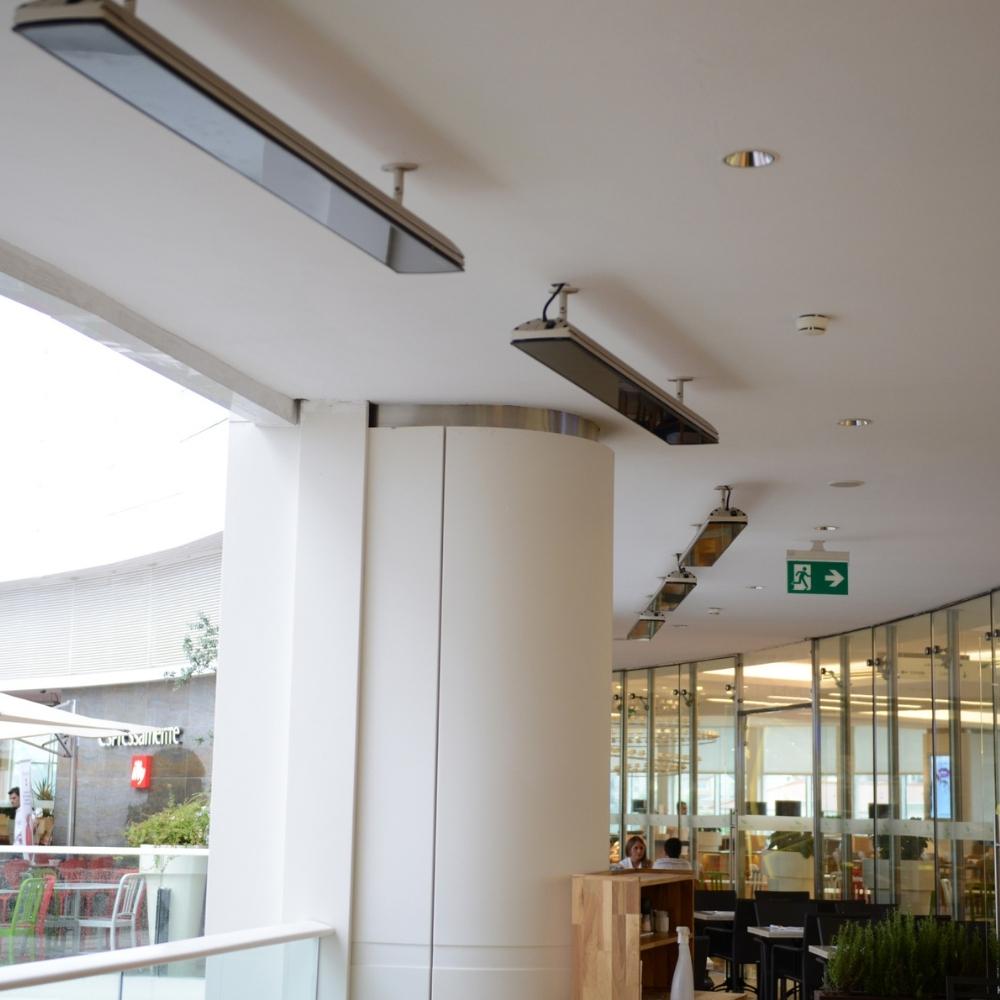 Heatscope Vision 65&quot; Black Electric Heaters in Restaurant Dining Area