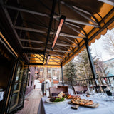 infratech sl series 63" electric patio heater at a restaurant - lifestyle view