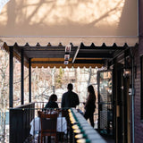 infratech sl series 63" electric patio heaters at a restaurant's terrace - installation view