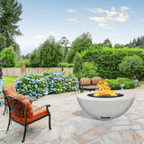 modern blaze round arctic fire bowl with smooth surface in a lush garden - detail view