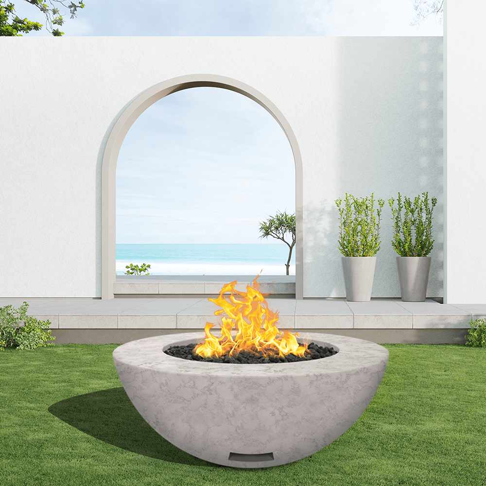 modern blaze round ivory fire bowl with textured surface in a light outdoor setting - angle view
