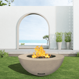modern blaze round bone fire bowl with smooth surface in a light outdoor setting - angle view