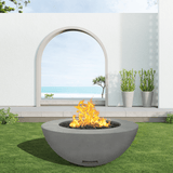 modern blaze round slate fire bowl with smooth surface in a light outdoor setting - angle view