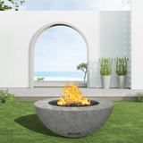 modern blaze round slate fire bowl with textured surface in a light outdoor setting - angle view