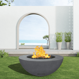 modern blaze round coal fire bowl with smooth surface in a light outdoor setting - angle view