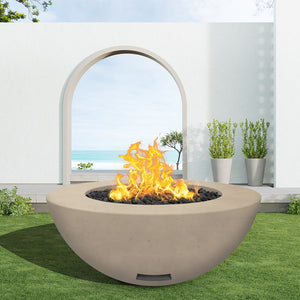 modern blaze round bone fire bowl with smooth surface in a light outdoor setting