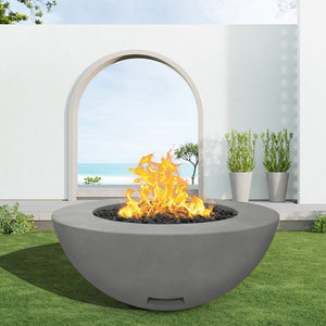 modern blaze round slate fire bowl with smooth surface in a light outdoor setting