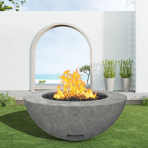 modern blaze round slate fire bowl with textured surface in a light outdoor setting