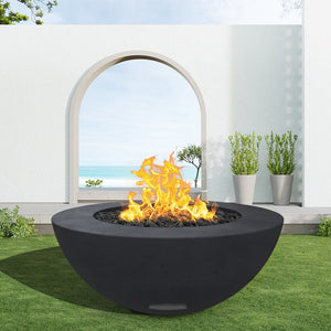 modern blaze round raven fire bowl with smooth surface in a light outdoor setting