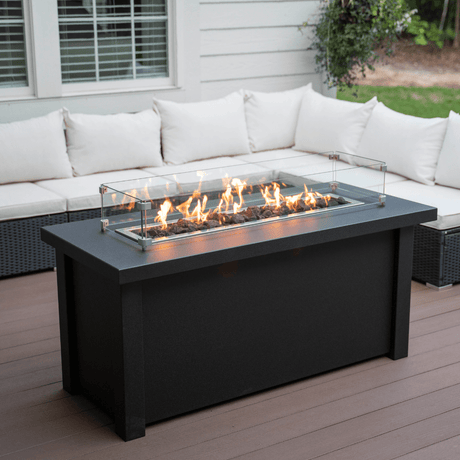 Modern Blaze 54-Inch Linear Fire Pit Table in cozy patio setting
