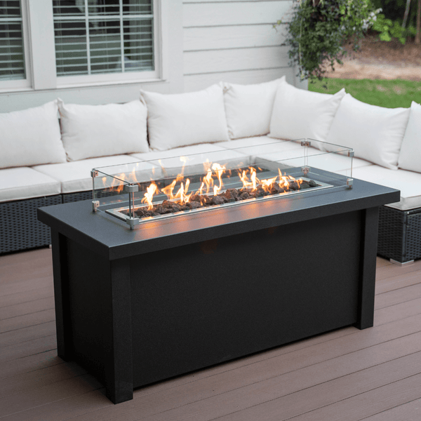 Modern Blaze 54-Inch Linear Fire Pit Table in cozy patio setting