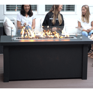 gathering around the Modern Blaze 54-Inch Linear Fire Pit Table 