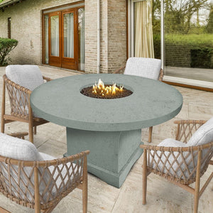 Modern Blaze Mt. Lassen Granite Round Fire Pit Table in a cozy patio setting