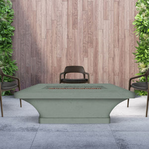 Modern Blaze Mt. Shasta Granite Chat Height Fire Pit Table in a lush patio setting