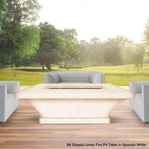 cream white gas fire pit table on a patio deck