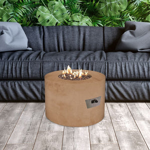 Modern Blaze Mt. St. Helens Stone Age Gas Fire Pit in lush outdoor setting