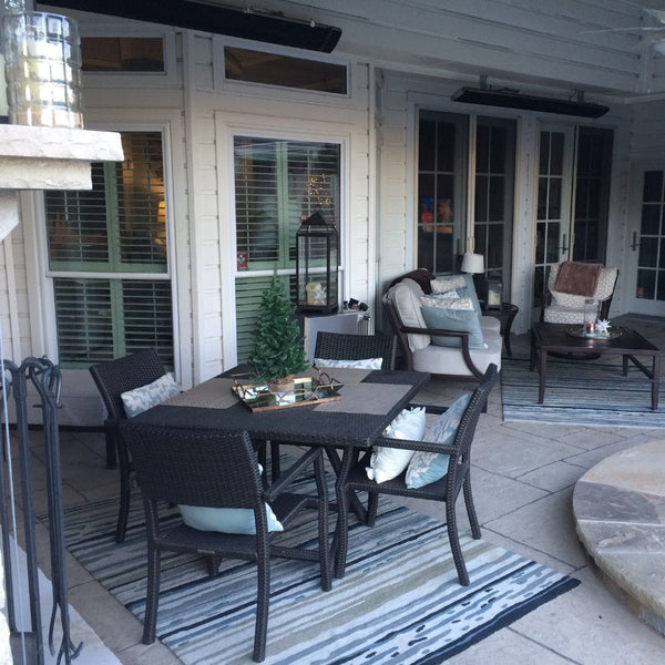 2 radtec design/e series infrared electric heaters ceiling mounted on a patio - installation view