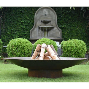 Seasons Fire Pits Concave Round Steel Fire Pit in the Garden