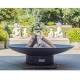Seasons Fire Pits Concave Round Steel Fire Pit by the Fountain - angle view