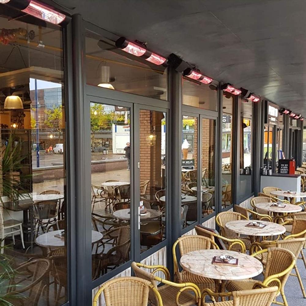 SUNHEAT 38&quot; Black 3000W 240V Infrared Electric Heaters in Outdoor Dining Area