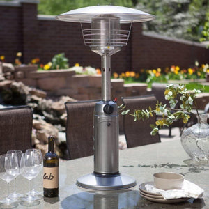 SUNHEAT Round Stainless Steel Tabletop Propane Patio Heater on a dining table