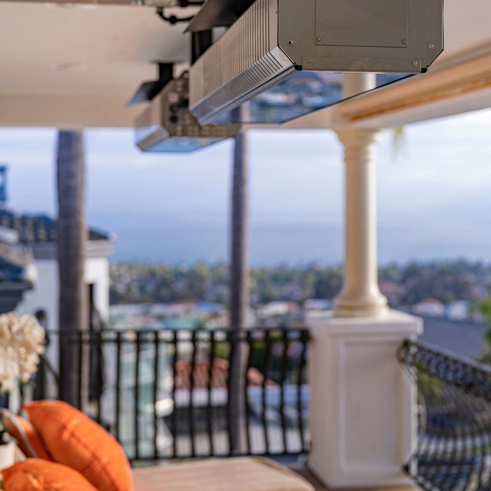 SunStar Glass Ceiling Mounted Infrared Gas Heaters in cozy patio setting