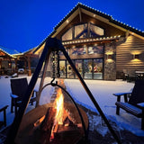 cowboy cauldron fire pit grill at a mountain lodge