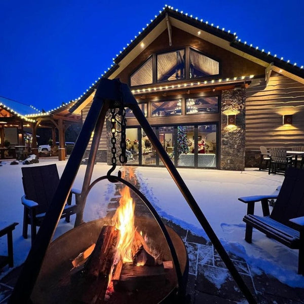 cowboy cauldron fire pit grill at a mountain lodge