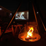 outdoor movie night with the cowboy cauldron fire pit grill