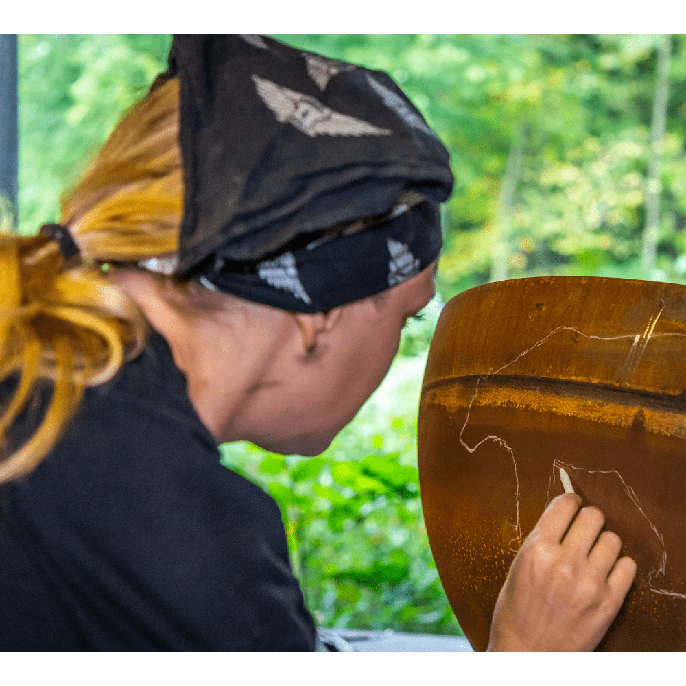 Drawing the art on The Fire Pit Gallery Fire Pits