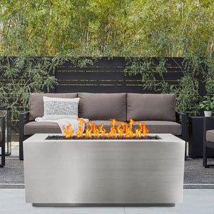Pismo 60" Stainless Steel Fire Pit with Brown Sofa and Greenery